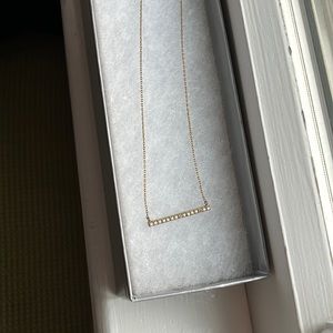 BAR necklace with fake diamonds. Gold color, not real gold. Great condition worn